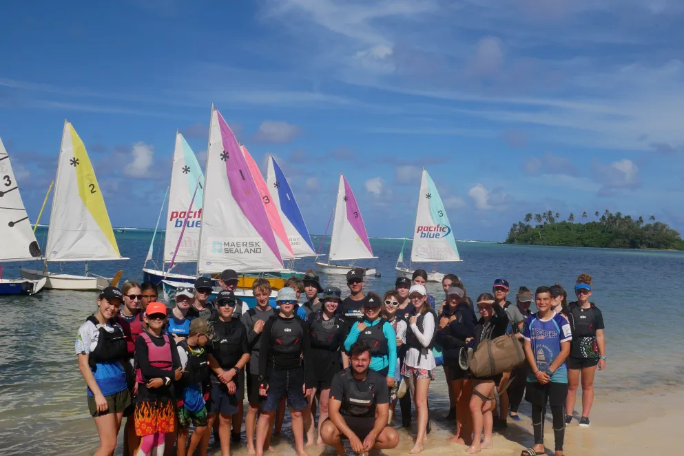 All the sailors on Muri Beach in front of the Sunburst yachts.