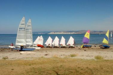 Gisborne YC boats on beach